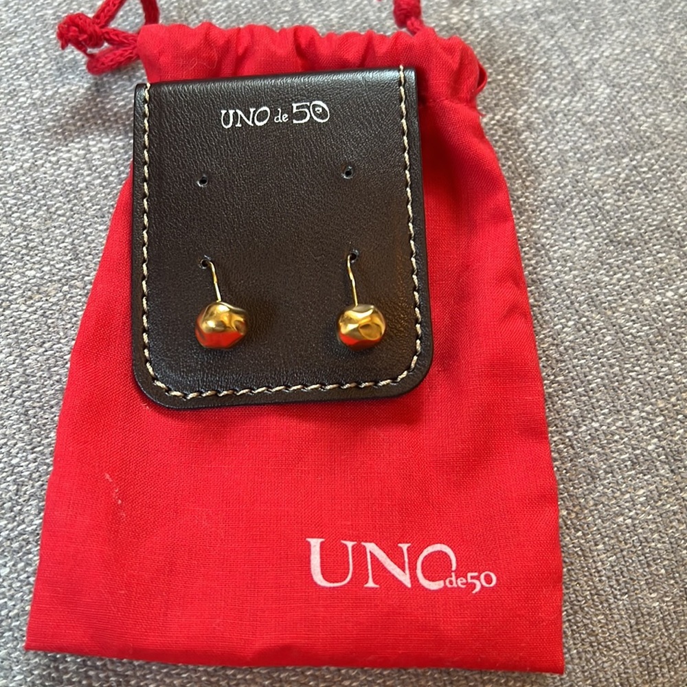 Uno de 50 Cherry Drop Earrings in gold.